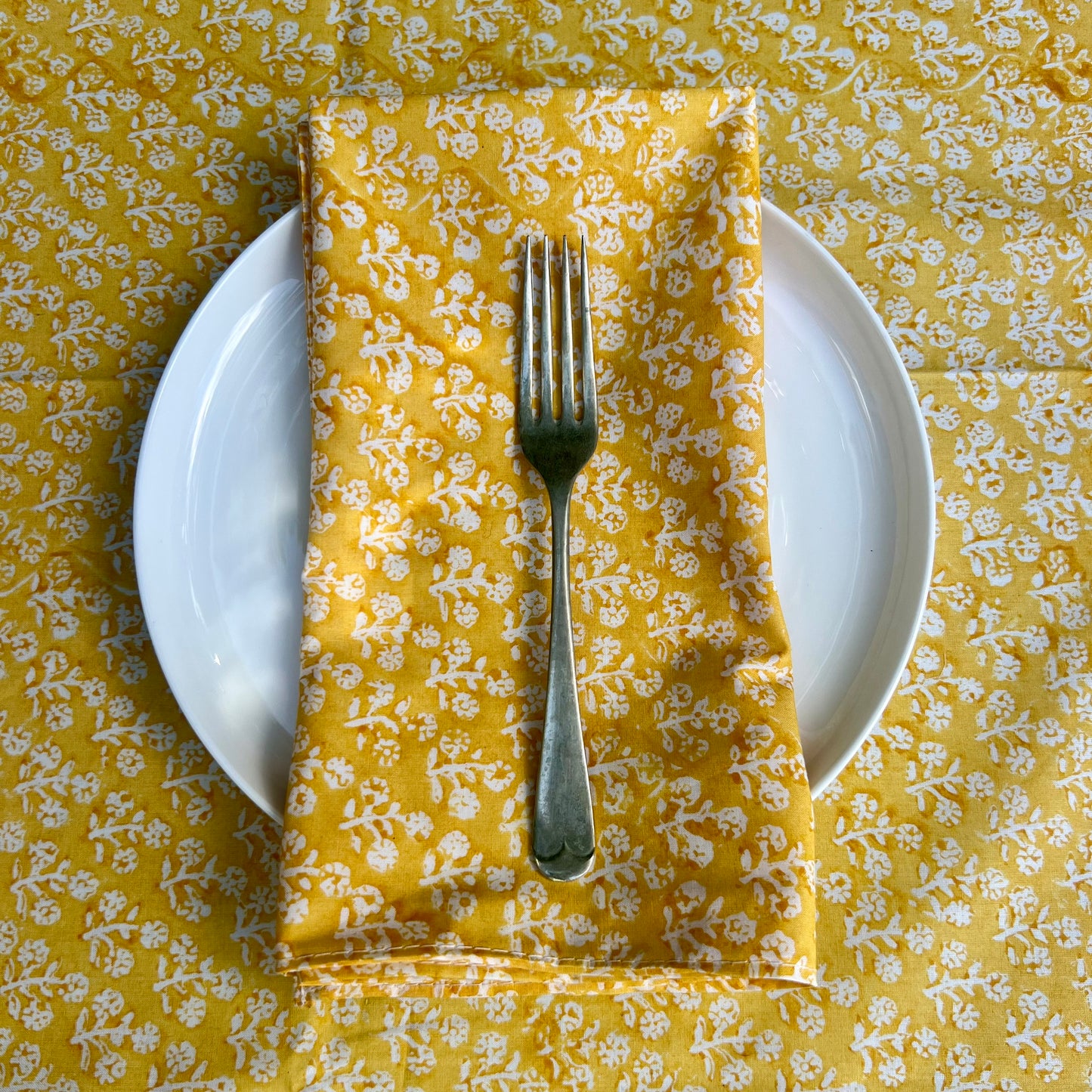 4 x block print daisy cotton napkin tumeric and white