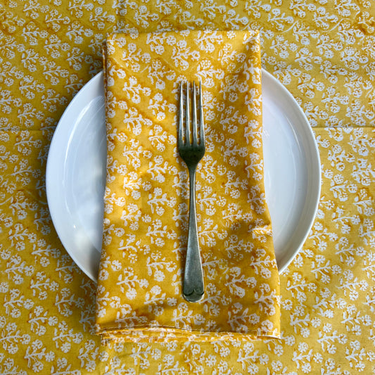4 x block print daisy cotton napkin tumeric and white