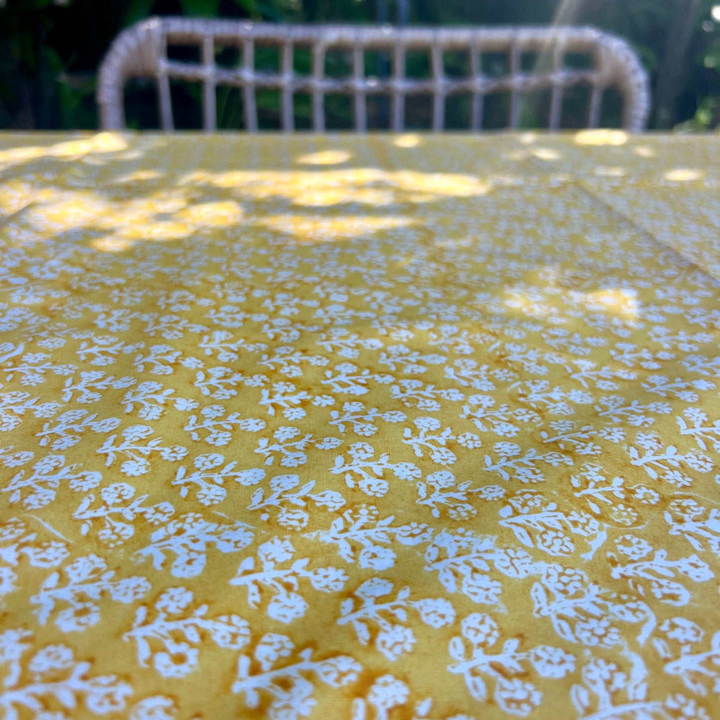 daisy block print cotton tablecloth tumeric and white